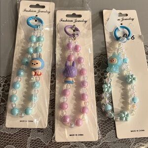 026,Bundle of three Beaded Phone Bracelet with Cute Labubu Doll Charm.